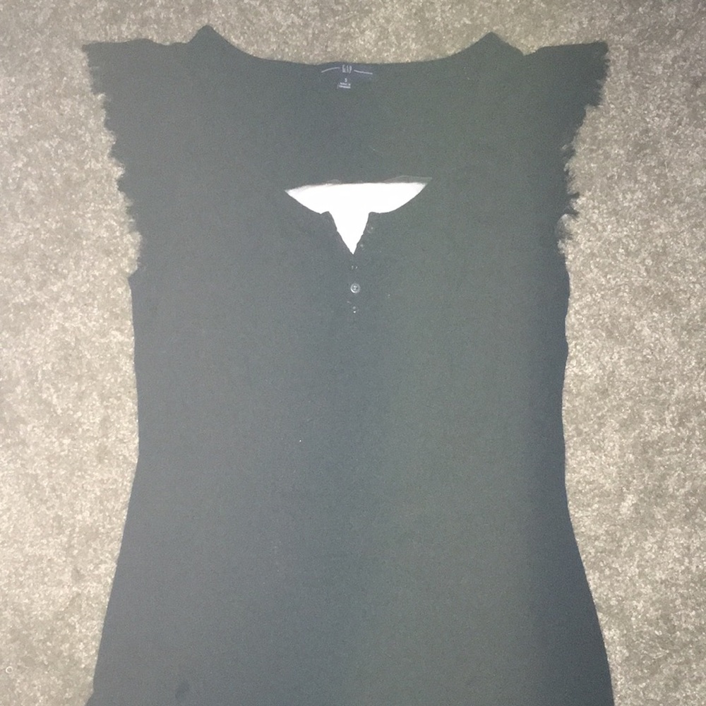 Black tank with ruffle sleeves and five buttons at the top.